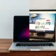 A vibrant, modern website design overlaying a faded, outdated one, symbolizing the need for a website redesign to improve digital presence and user engagement.