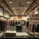A 'Store Closing' sign in a women's fashion store, symbolizing the profound impact of a significant **women's fashion bankruptcy** on the retail landscape.