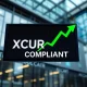 A digital display showing XCUR stock ticker with a green checkmark, symbolizing Exicure Inc.'s successful XCUR Nasdaq compliance.