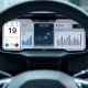 A digital dashboard shows financial data and a highlighted date, signaling the upcoming XPENG Earnings report for Q2 2025.