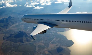 Commercial airliner during airline Mexico expansion over Mexican coastline