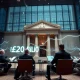 Bank of England QE reform discussion showing financial leaders analyzing £20 billion savings opportunity
