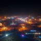 Burning Man homicide investigation scene with police lights at desert festival