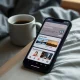 ChatGPT Pulse displaying personalized morning briefs with AI-generated cards on smartphone