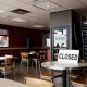 Fast-casual restaurant chain Chapter 7 bankruptcy closure with empty dining area