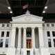 Federal Reserve building illustrating potential interest rate cuts and economic impact