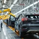 Ford production problems causing quality inspection delays at automotive factory assembly line