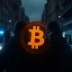 French police responding to crypto-kidnapping case with digital currency symbols in background