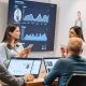 Young entrepreneurs demonstrating Gen Z fundraising strategies for fashion tech startup Phia
