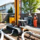 Compact geothermal drilling rig revolutionizing clean energy installation in residential settings