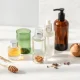 Premium glass cosmetic bottles showcasing sustainable luxury packaging for beauty products