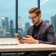 Entrepreneur using Google Pixel 10 business smartphone for productivity and connectivity