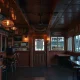 Closed iconic BBQ restaurant with historic signage and empty dining area