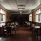 Italian restaurant bankruptcy showing closed dining establishment with empty tables