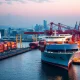 Japan exports analysis showing container ships and economic data charts