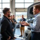 Kevin Paul Dodd demonstrating automotive business success through hands-on leadership in modern repair facility