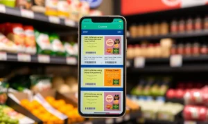 Kroger digital coupons displayed on smartphone screen during grocery shopping