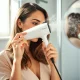 Professional woman using Laifen high-speed hair dryer for efficient morning routine