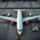 Low-cost airline cuts service to multiple destinations with aircraft sitting idle at gates