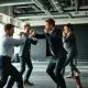 Mark Zuckerberg demonstrating MMA techniques to Meta executives during corporate training session