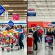 Sam's Club members celebrating shopping victory over Costco with carts full of savings