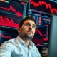 Analyst assessing critical delisting risks for cryptocurrency investors with market data visualization