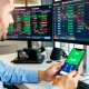 Professional trader analyzing Skrill fees forex transaction costs on digital dashboard