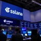 Solana Nasdaq listing celebration with STKE ticker symbol on digital market display