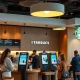 Starbucks in-store experience transformation showing digital ordering and modern cafe design