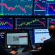Stock market today showing declining charts during final Q3 trading week with key economic indicators