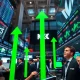 Stock market today showing positive recovery trends with green indicators and upward momentum