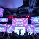 StockPil Disrupt 2025 conference stage featuring top startup scaling experts and investors
