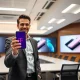 T-Mobile CEO discussing Apple iPhone partnership strategy during product launch announcement
