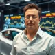 Elon Musk Tesla compensation package announcement with AI and robotics background