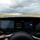 TuneIn FEMA emergency alerts displayed on car dashboard during severe weather conditions