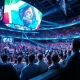 Business executives analyzing eSports sponsorship opportunities during major gaming tournament