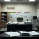 Media watchdog office during Chapter 7 bankruptcy liquidation process with legal documents