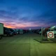 Troubled trucking company shutdown showing abandoned trucks and closed facilities