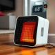 An affordable Amazon space heater providing quick warmth in a home office setting.