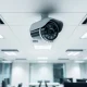 Modern office security camera system installed for comprehensive business surveillance and theft prevention.
